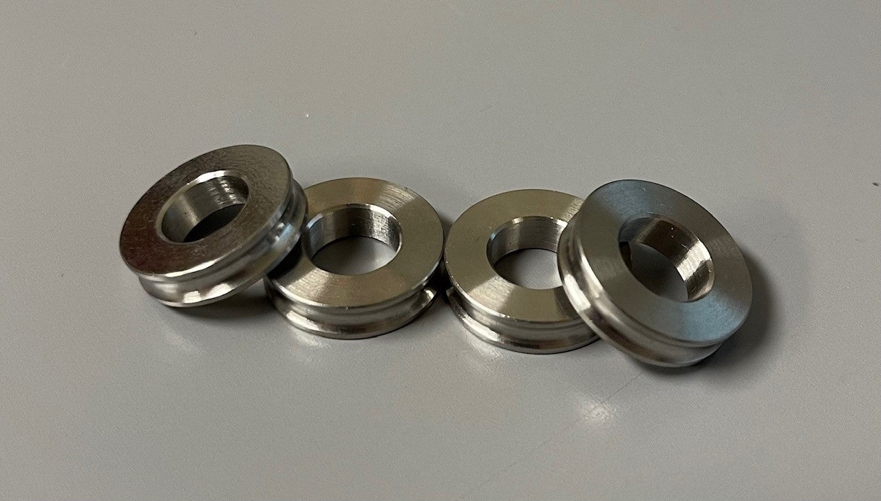 ST01-55 TITANIUM BRAKE CALIPER SPACER SET BLACK OR SILVER