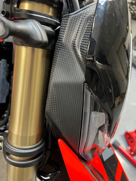 ST4090 STC CARBON HEADLIGHT SURROUND R&L HM698